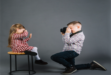 Child sharing toys with friends during kindness activity