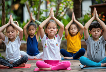 Preschool children practicing yoga for balance and flexibility